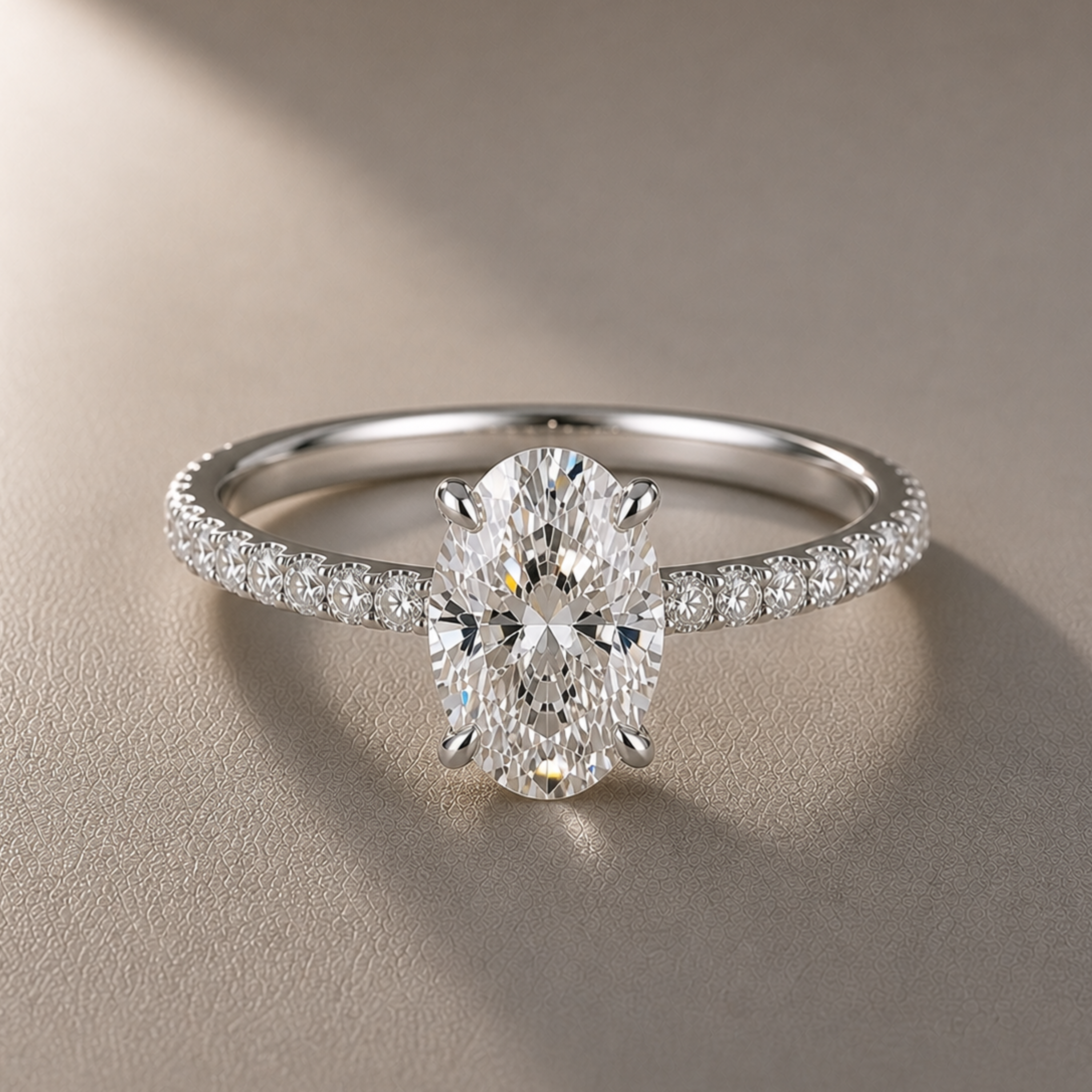 2ct Oval Diamond Ring on a Pavé Band With a Hidden Gallery Halo