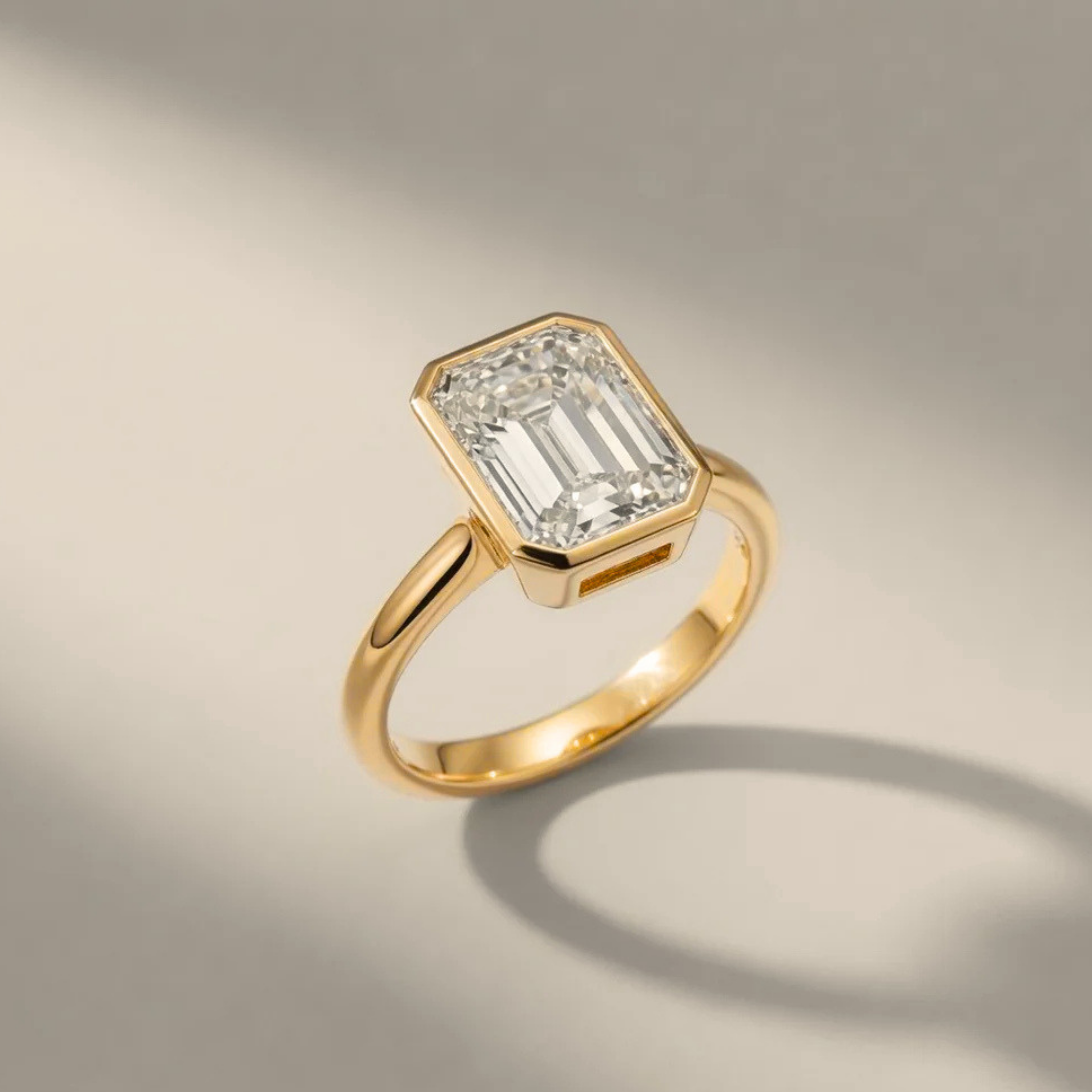 3ct Emerald Cut Diamond Bezel-Set Ring in 14k Yellow Gold
