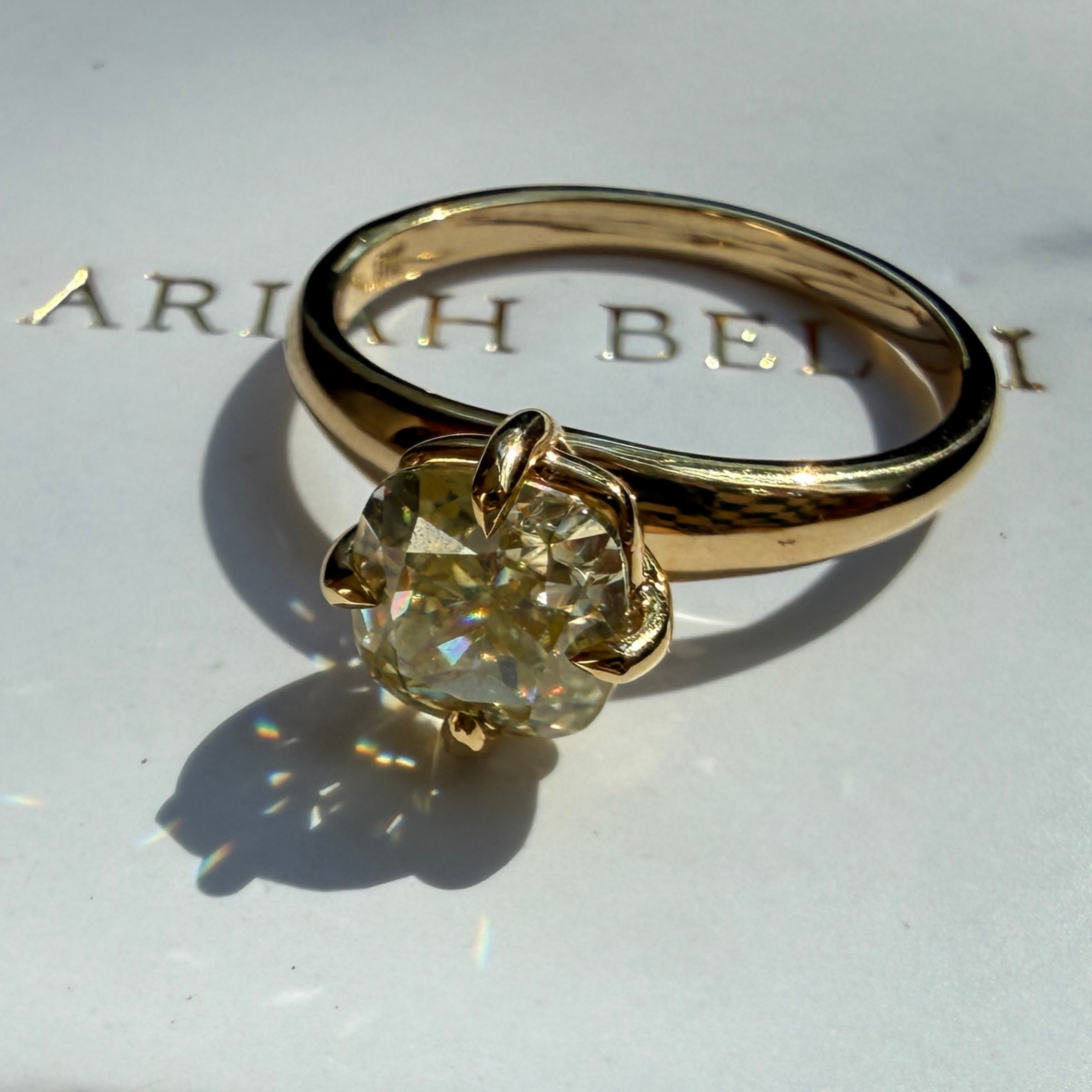 1.5 Carat Fancy Yellow Cushion Cut Diamond Compass Set Engagement Ring