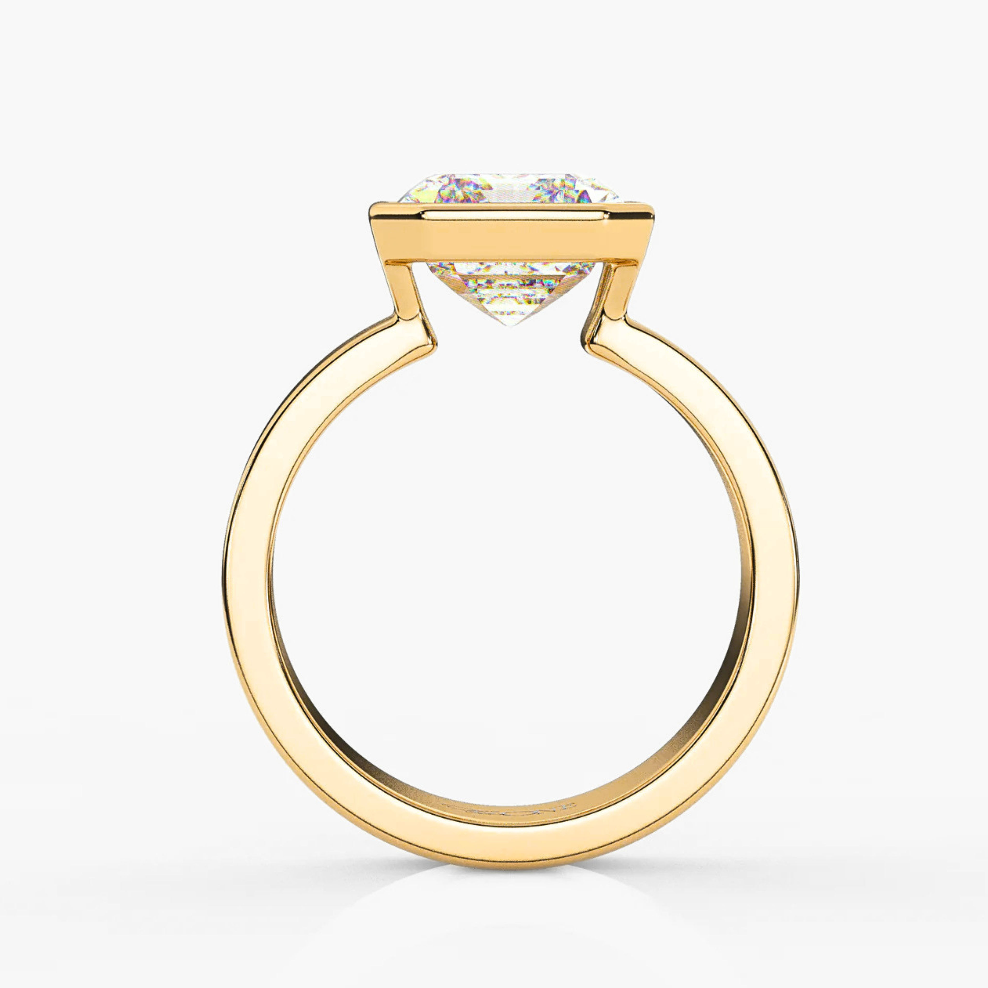 Emerald-Cut Diamond Bezel Ring on a Cigar Band