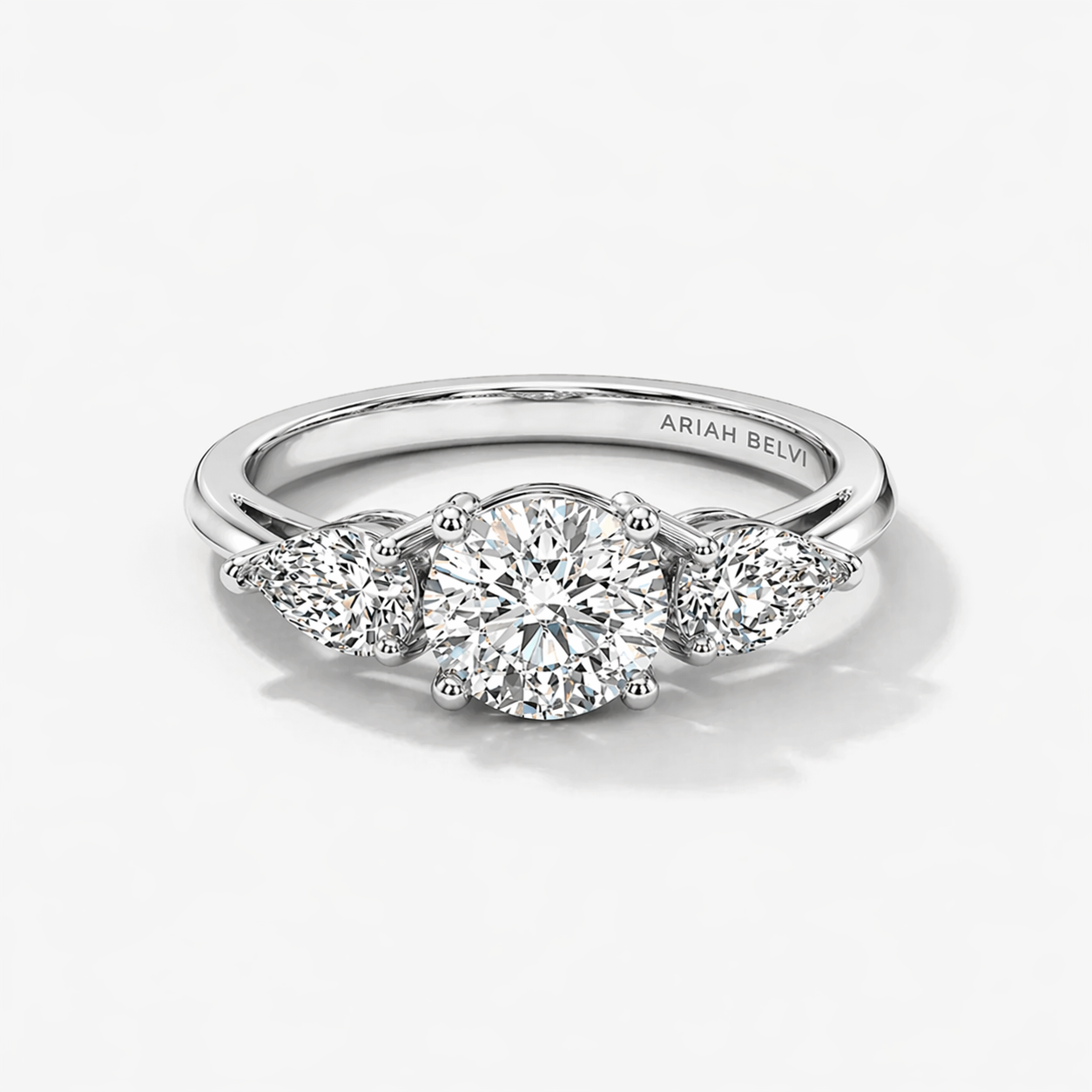 Round Diamond Trilogy Ring with Pear Side Stones