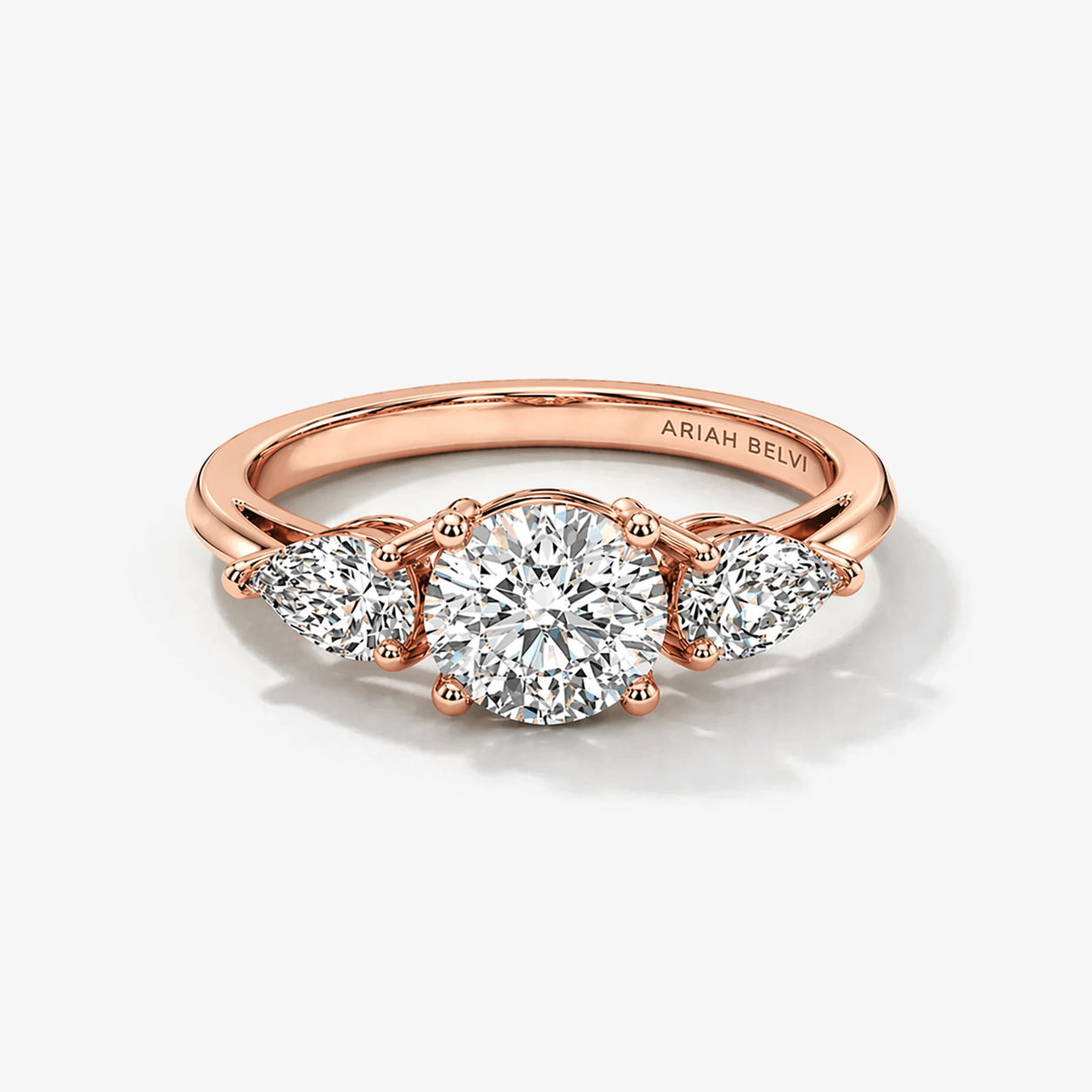 Round Diamond Trilogy Ring with Pear Side Stones