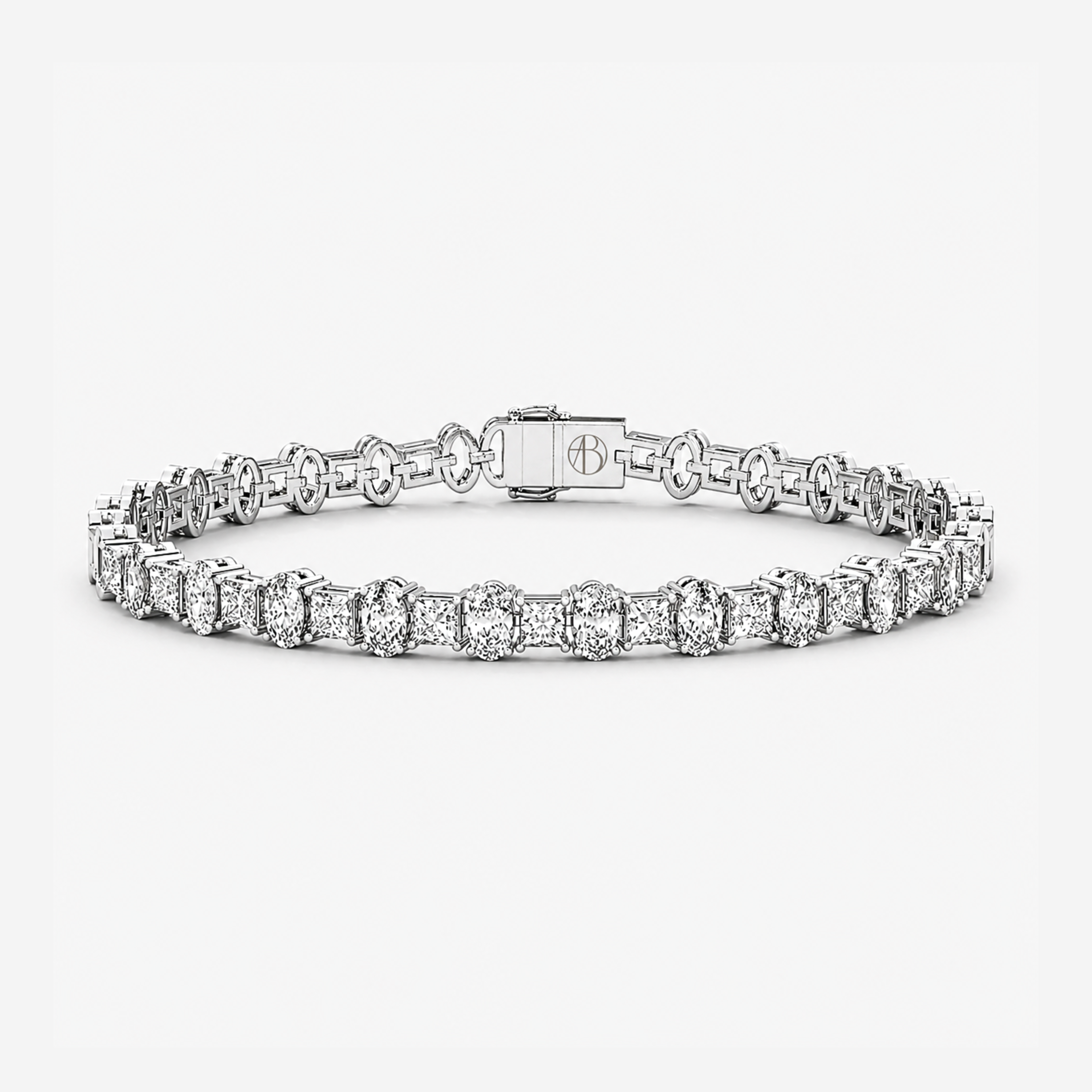 Oval and princess cut diamond tennis bracelet in white gold