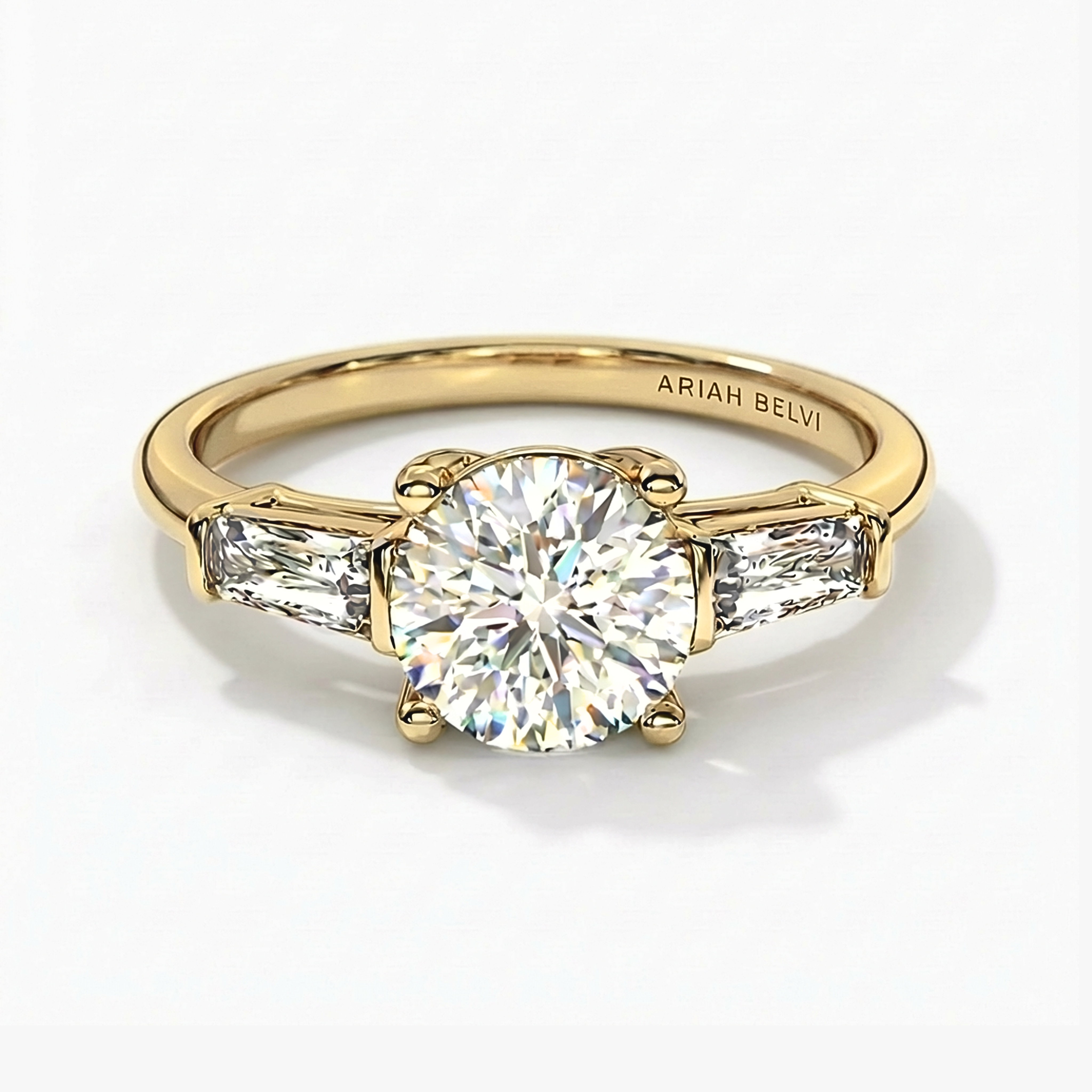 Round Brilliant Diamond Trilogy Ring with Tapered Baguette Side Stones