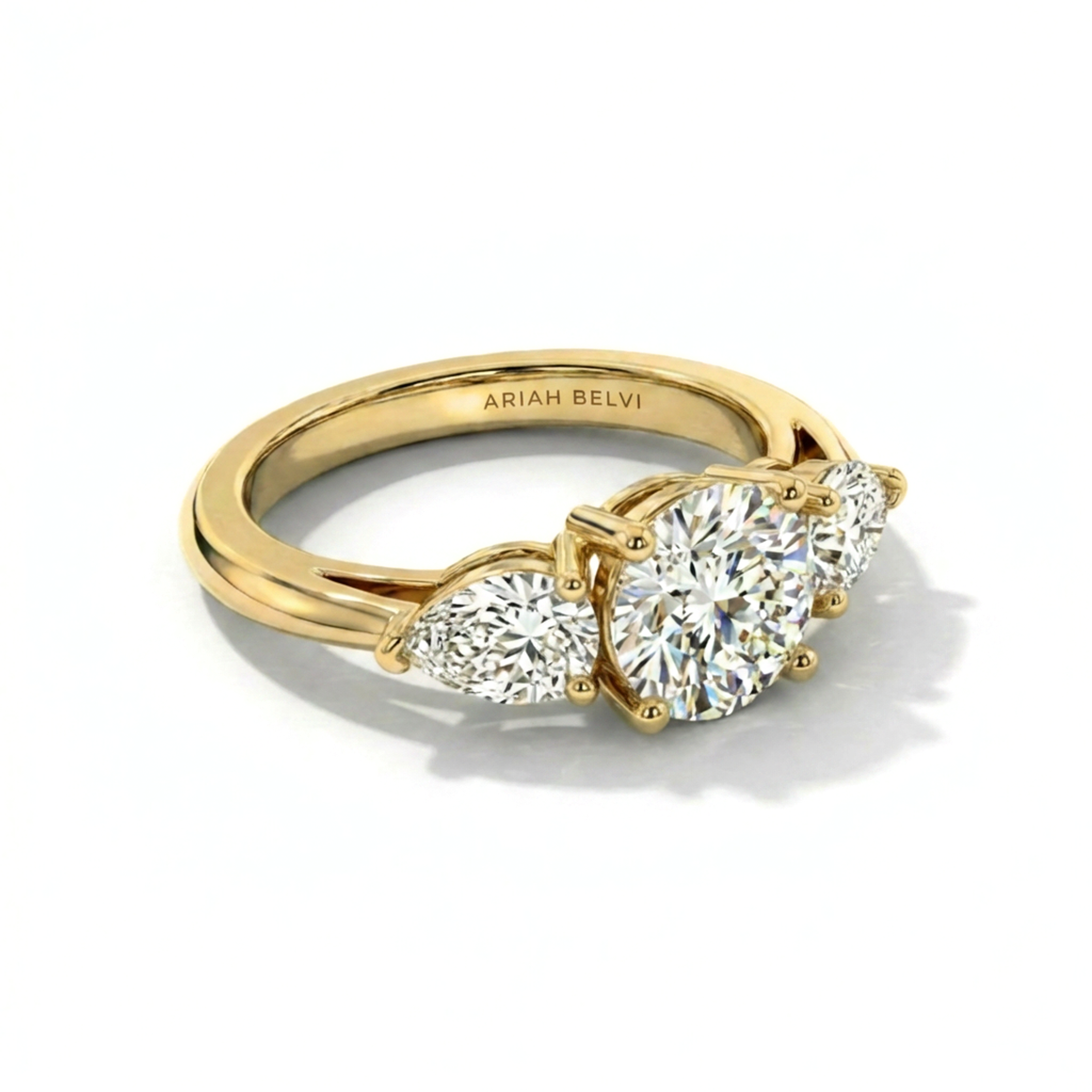 Round Diamond Trilogy Ring with Pear Side Stones