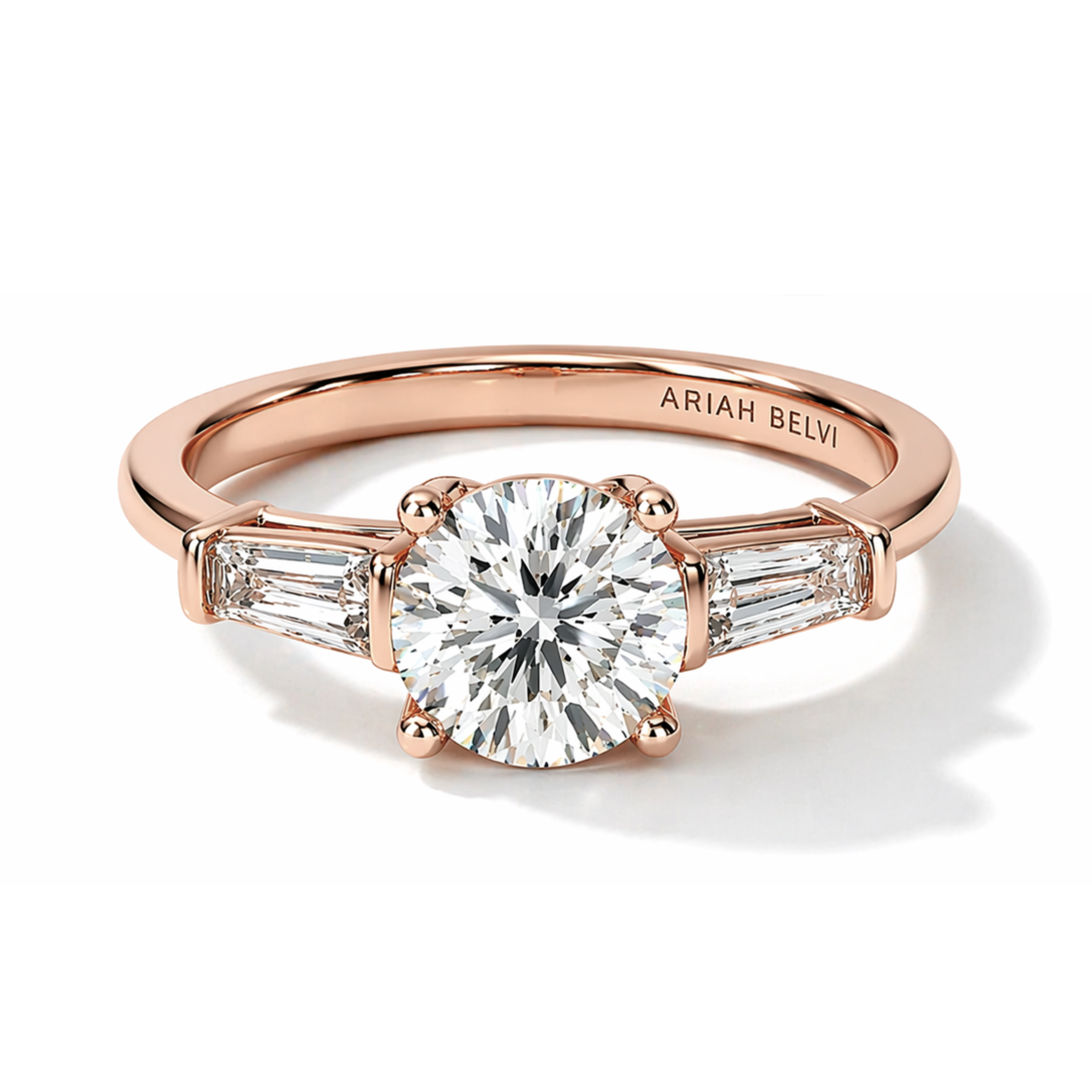 Round Diamond Trilogy Ring with Tapered Baguette Accents