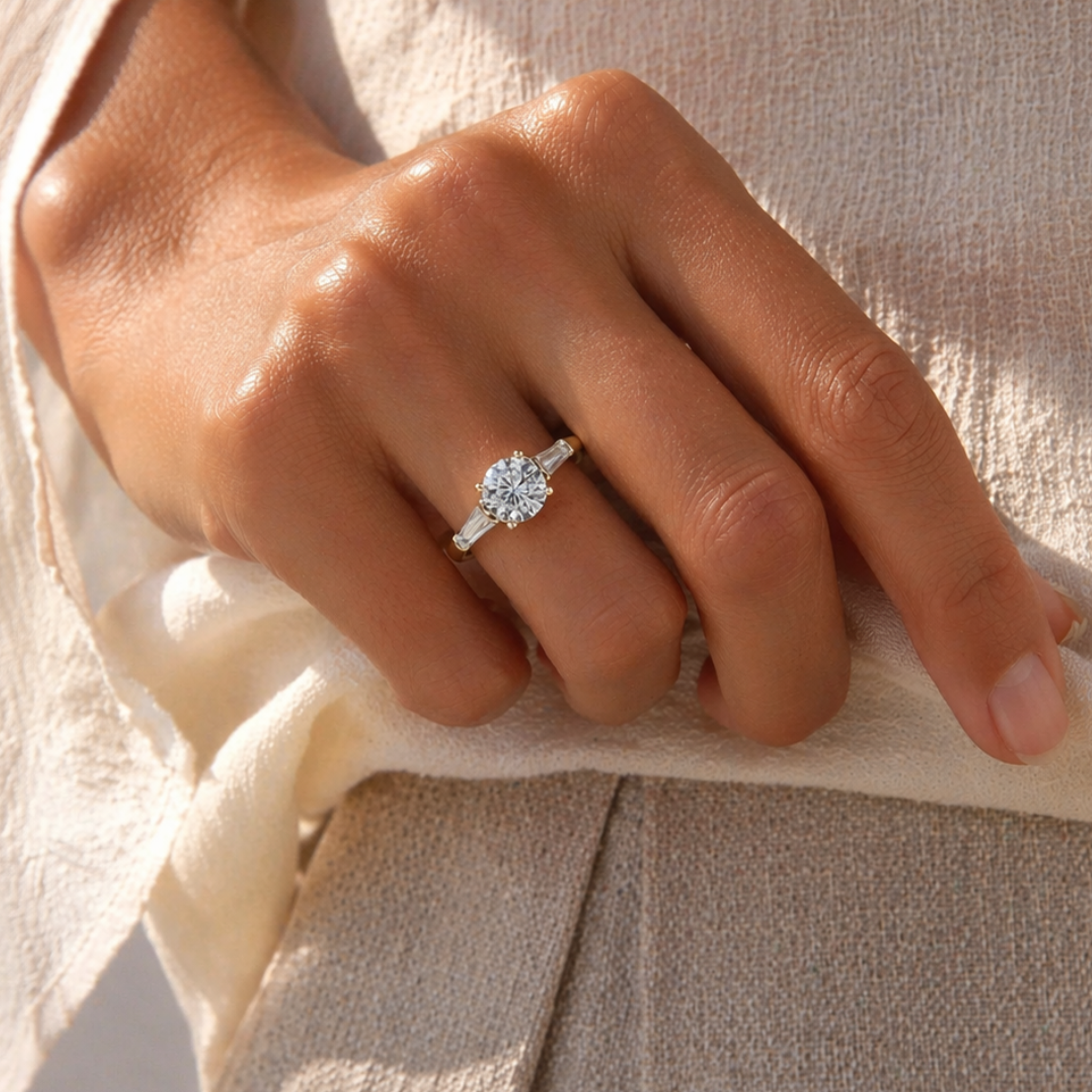 Round Brilliant Diamond Trilogy Ring with Tapered Baguette Side Stones