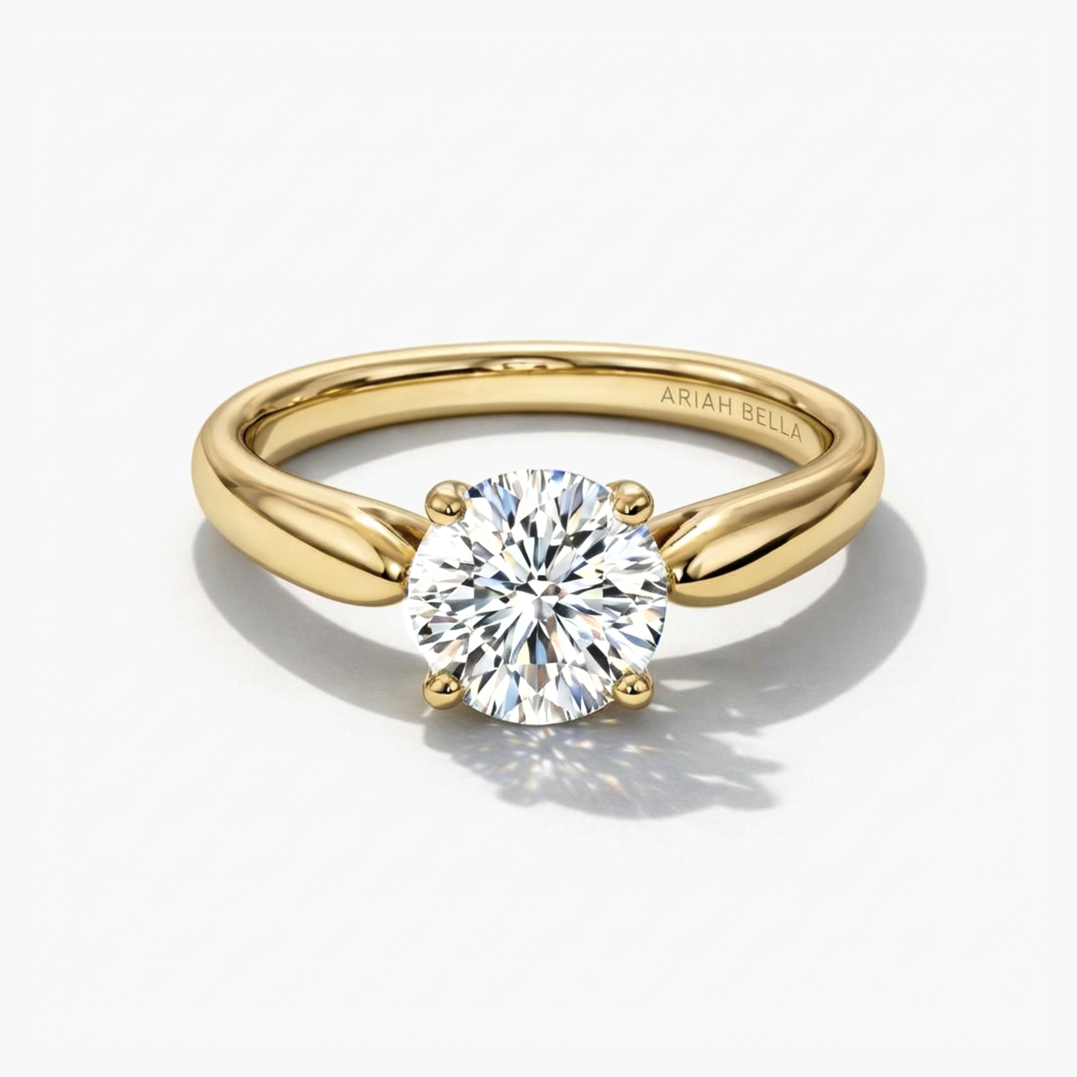 Round Brilliant Solitaire 4-Claw, Tapered Band