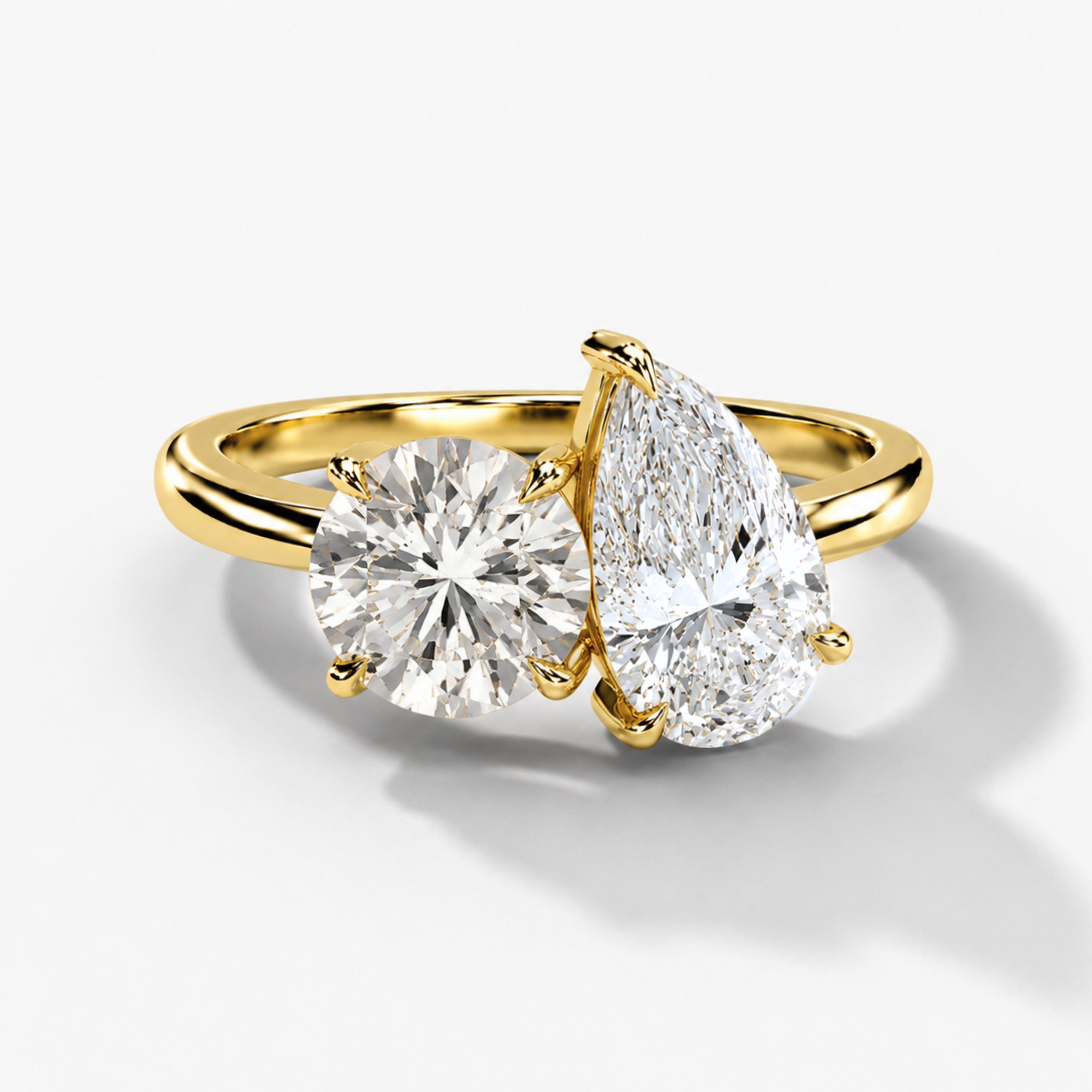 Round & Pear-cut Diamond Toi et Moi Engagement Ring