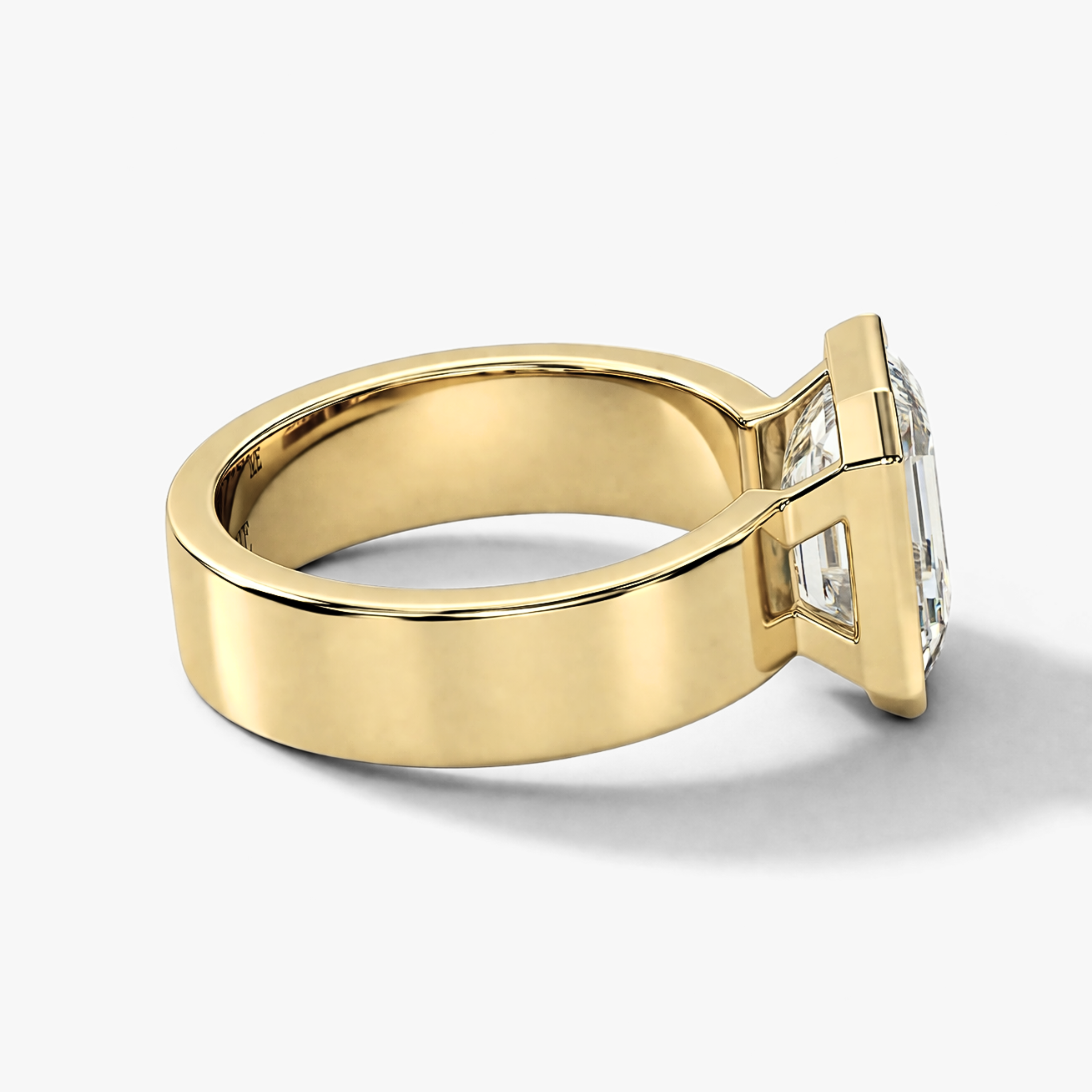 Emerald-Cut Diamond Bezel Ring on a Cigar Band