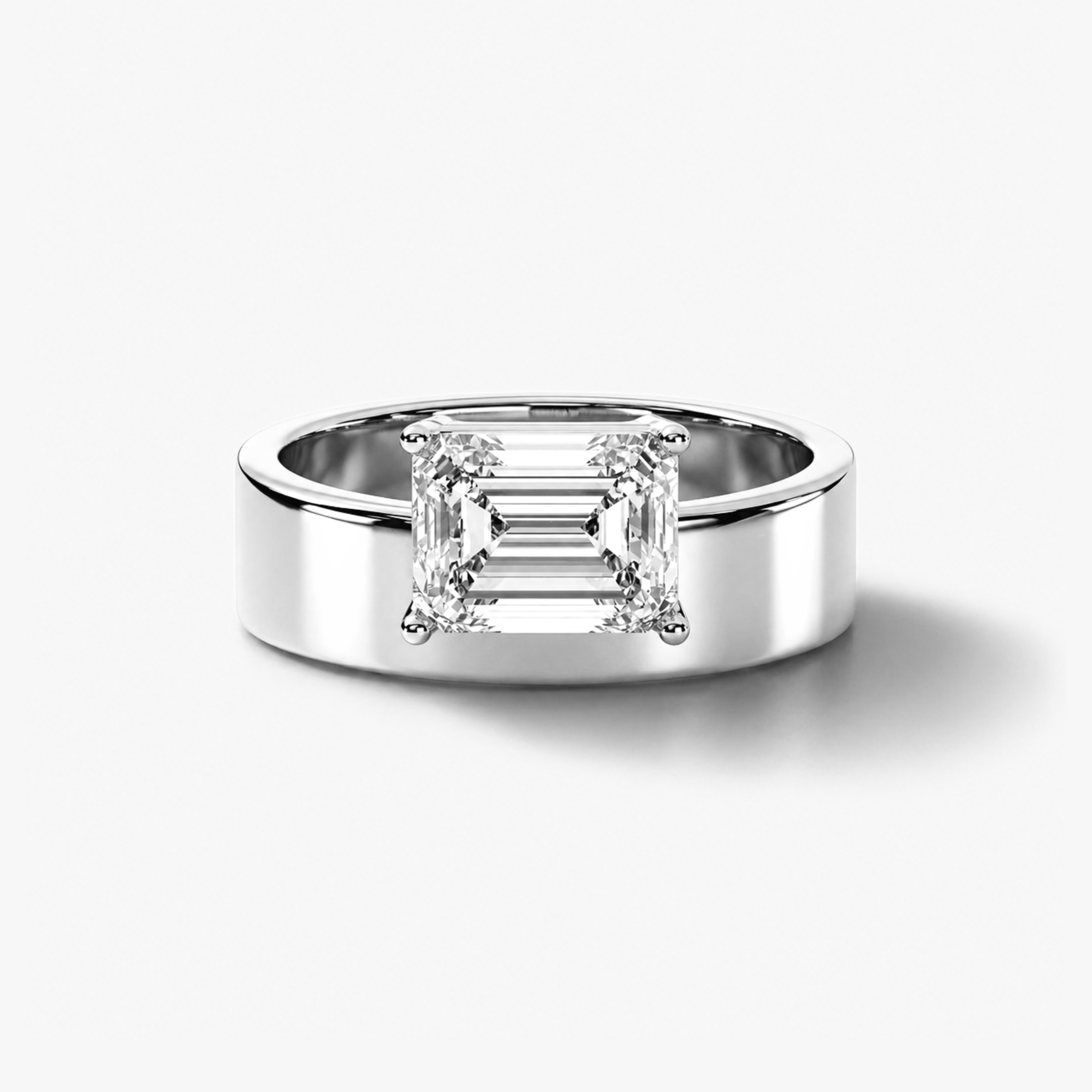 East–West Emerald Cut Diamond Ring on Cigar Band