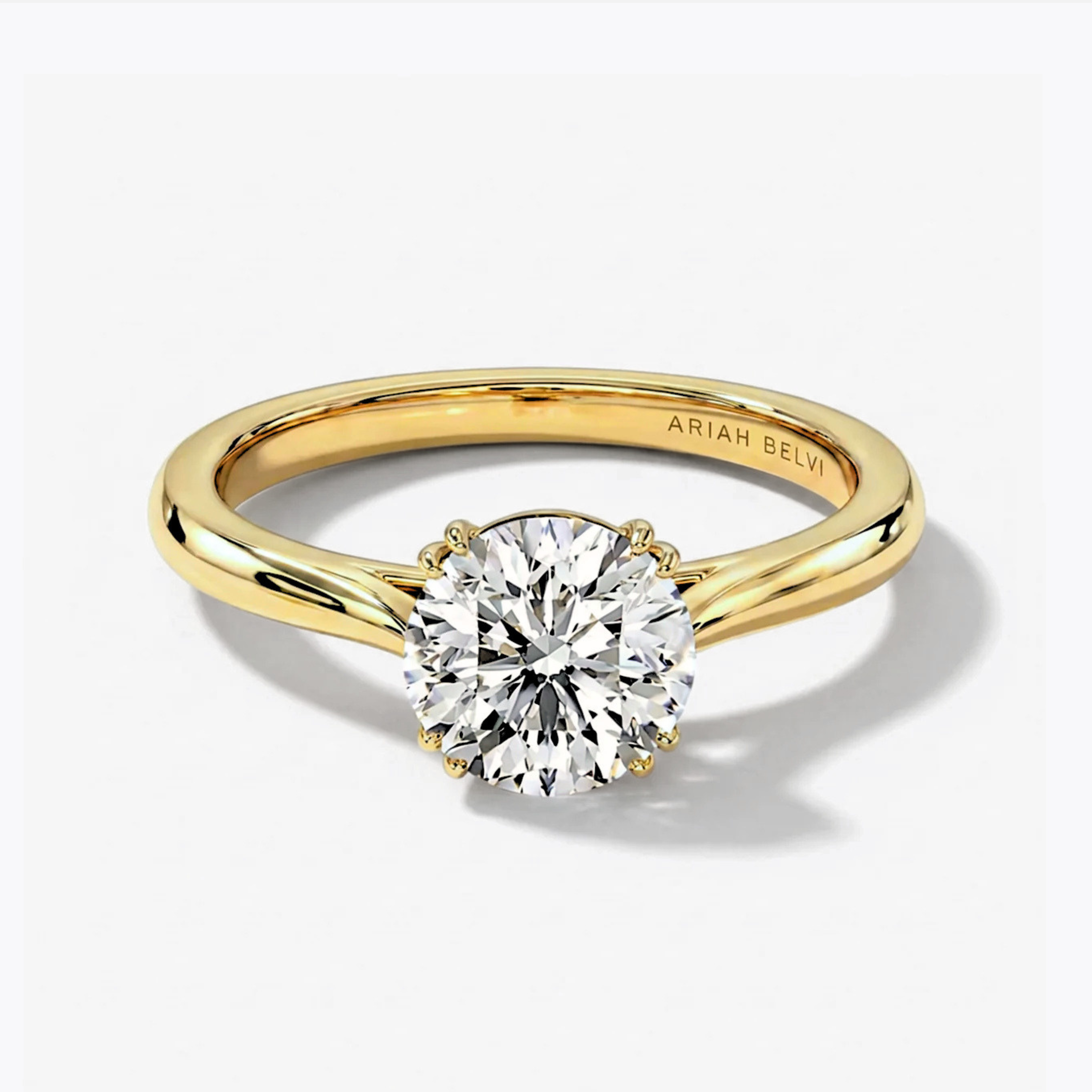 Round Brilliant Diamond Solitaire Engagement Ring with Double Claw Setting