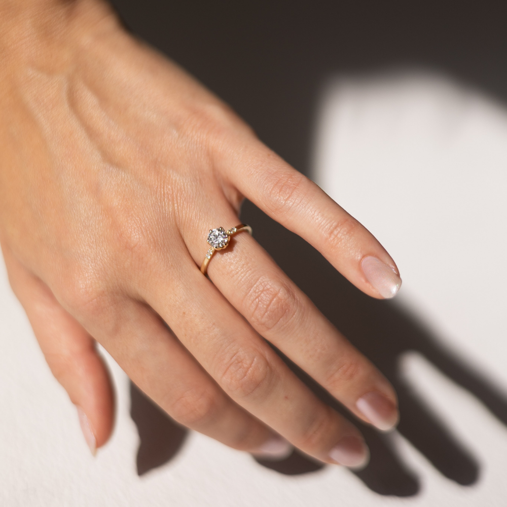 ARIAH BELVI bespoke 0.70ct Round Brilliant Diamond Ring with Petite Side Accents in 14k Yellow Gold