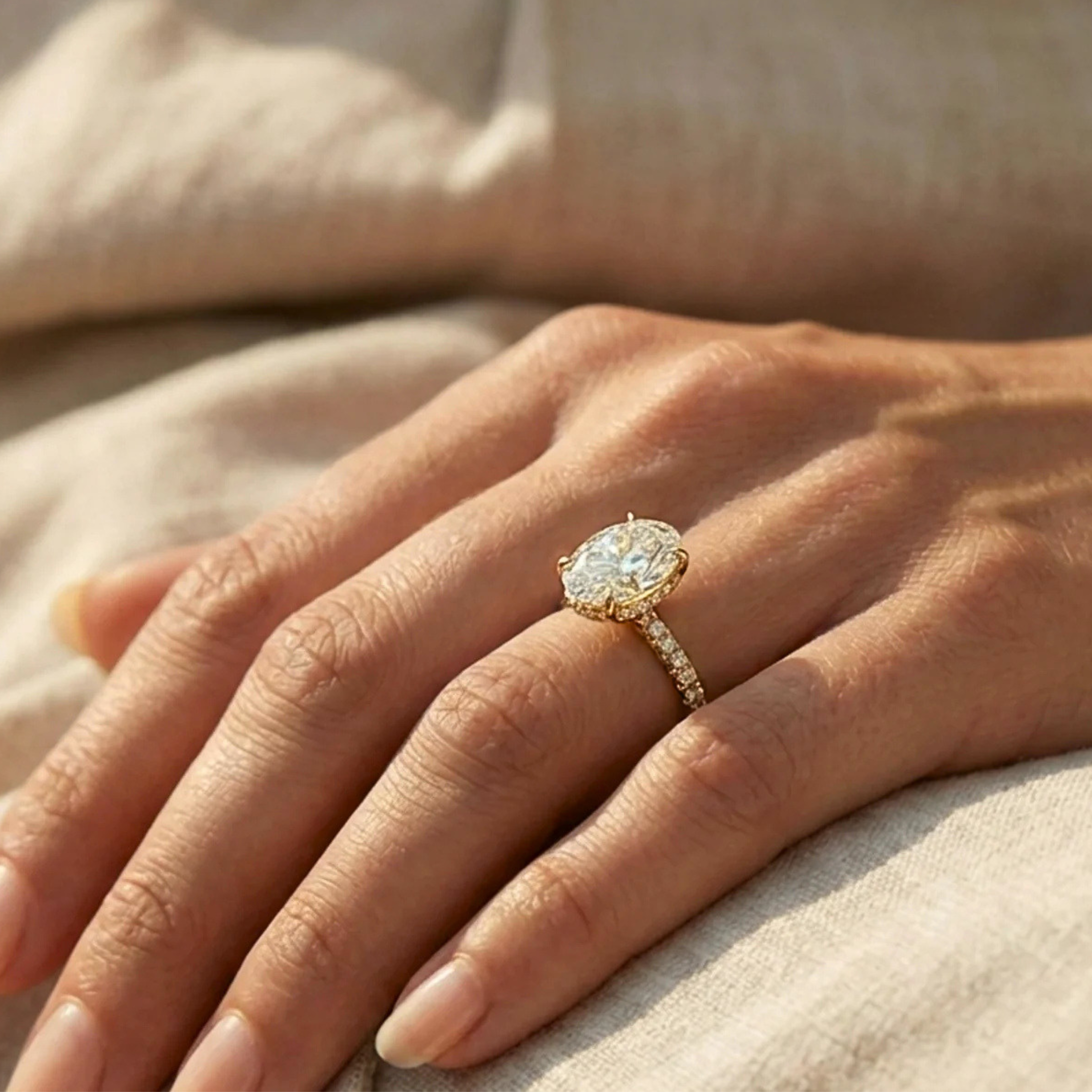 Oval Diamond Engagement Ring with Pavé Band and Hidden Halo