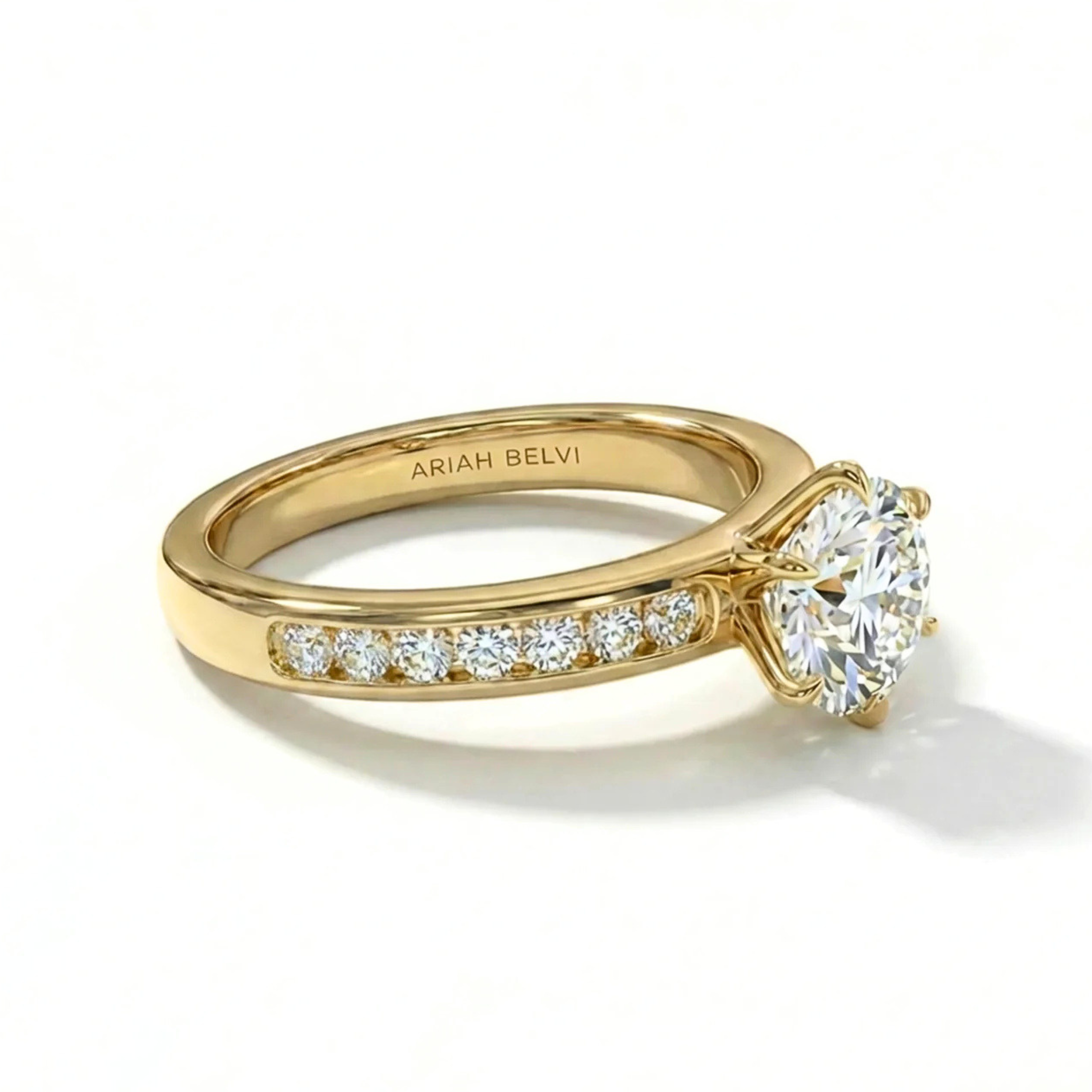Round Brilliant Diamond Engagement Ring with Six-Claw Setting and Channel-Set Band