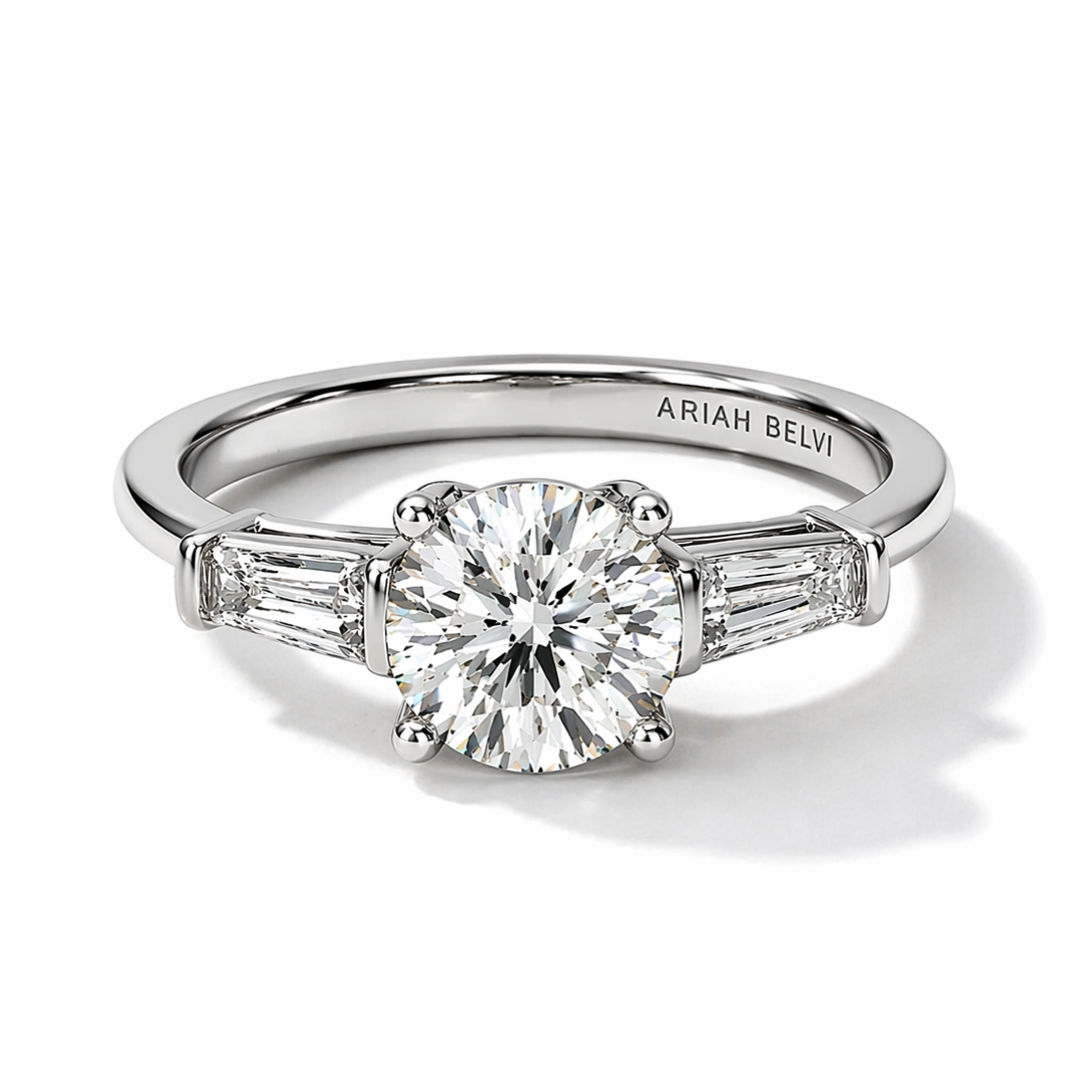 Round Diamond Trilogy Ring with Tapered Baguette Accents